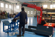 2 ton portable hydraulic crane Omnia for lifting and positioning steel pipes
